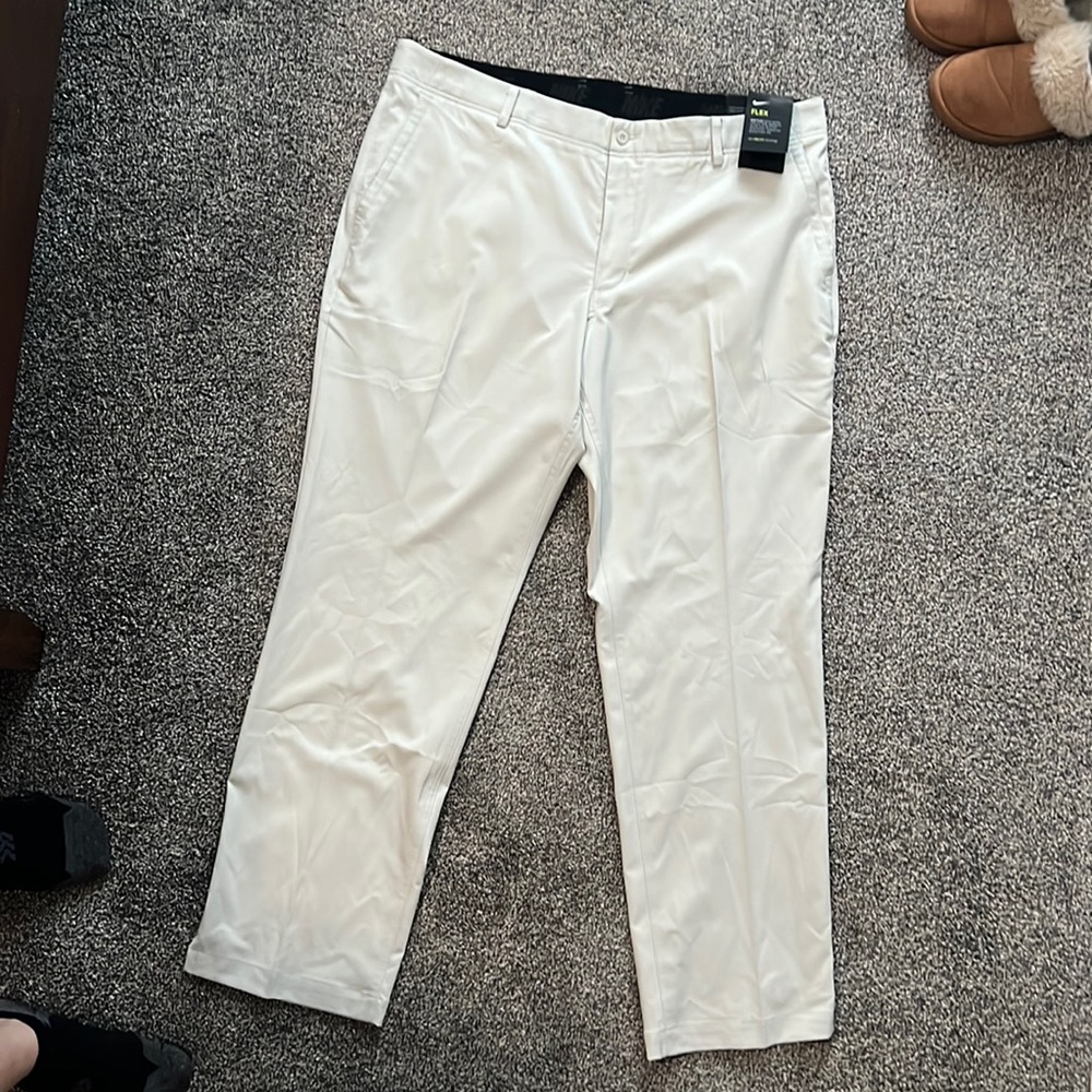Nike golf pants brand new with tags. Size is a 40 waist and length is 32.